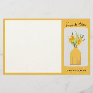 Vibrant yellow flower arrangement in a modern vase stationery