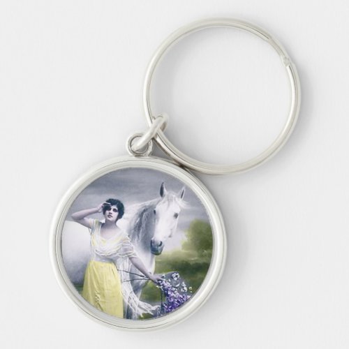 victorian girl with white horse keychain