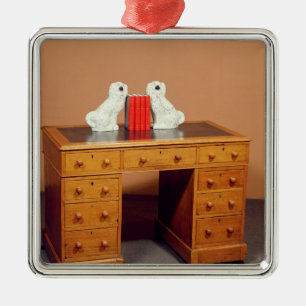 Victorian kneehole desk and a pair of dogs metal ornament