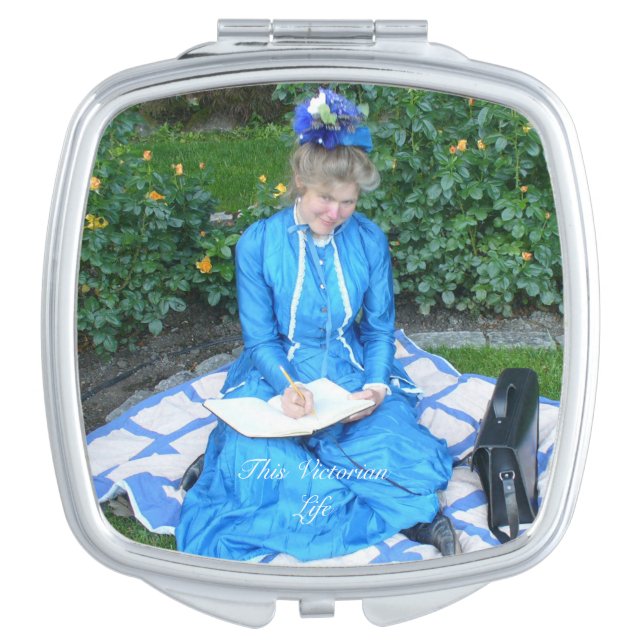 Victorian lady writing in garden compact mirror (Front)