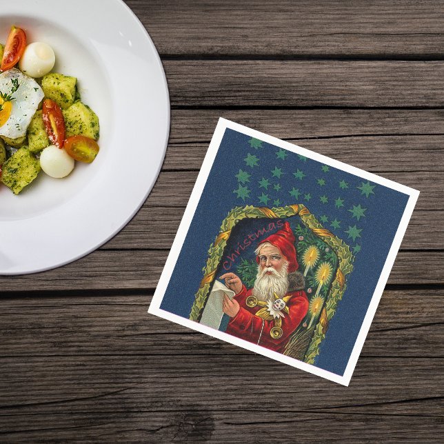 Victorian Santa Checking List Candles Holly Paper Napkins (Victorian Santa Claus checking his list candles stars on dark blue Christmas napkins.)