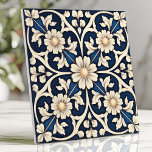 Victorian Sapphire Blue and Ivory Daisy Ceramic Tile<br><div class="desc">This Victorian-inspired Arts and Crafts design showcases a stunning deep sapphire blue background adorned with soft ivory daisy clusters and intricate swirling tendrils. The hand-painted style and symmetrical floral tracery evoke a timeless antique charm, perfect for elevating backsplashes, accent walls, or decorative installations. With its elegant combination of rich colors...</div>