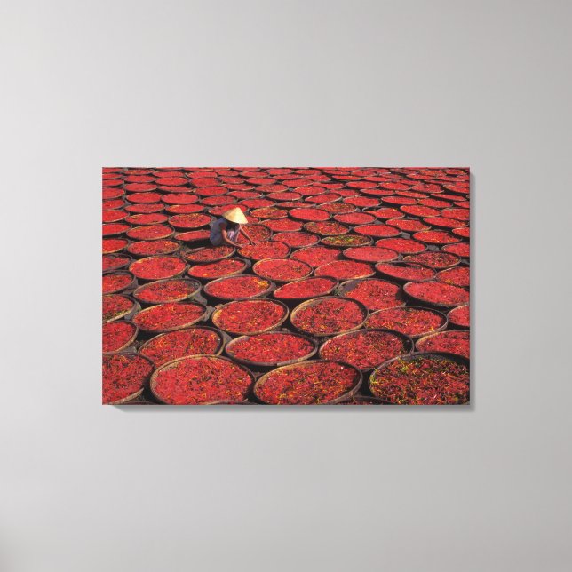 Vietnam. Candy drying in baskets under the Canvas Print (Front)