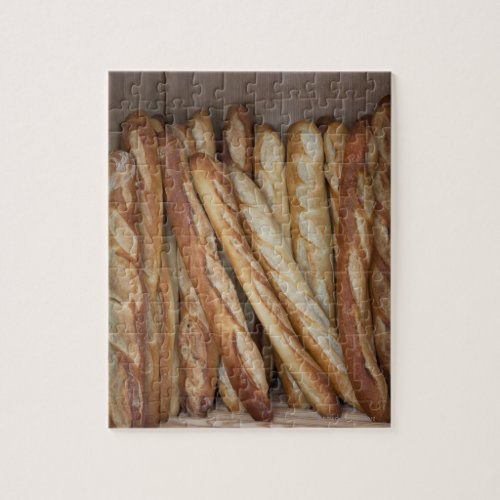 view of bread loaves in bakery window display jigsaw puzzle