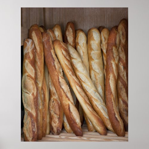 view of bread loaves in bakery window display poster