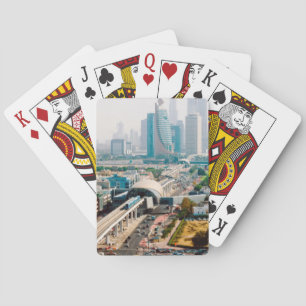 View of city metro line and skyscrapers poker cards