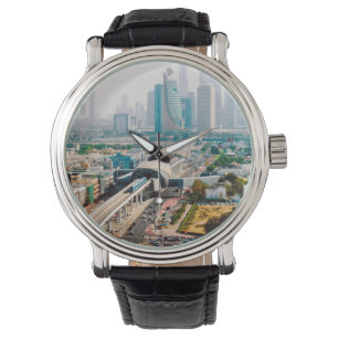 View of city metro line and skyscrapers watch