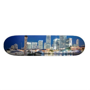 View of skyline with reflection in water, Miami Skateboard Deck