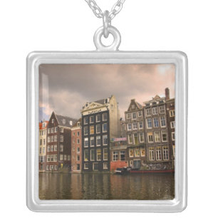 View of the unique architecture and gabled silver plated necklace