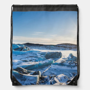 View over the frozen glacial lake drawstring bag