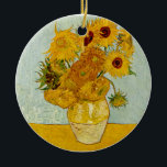 Vincent Van Gogh 12 Sunflowers Impressionist Ceramic Ornament<br><div class="desc">Vincent Van Gogh's Vase with 12 Sunflowers is one of Van Gogh's famous Sunflower series. This painting of sunflowers is part of Van Gogh's second set of beautiful impressionist sunflower paintings, which he created in 1888. The sunflowers are yellow against a background of light blue. As in all of Van...</div>