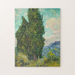Vincent Van Gogh Cypresses Jigsaw Puzzle<br><div class="desc">Beautiful vintage artwork famous impressionist painter Vincent Van Gogh. This impressionism art features cypress trees in a field in front of swirling clouds and a moon in the sky. The teals,  yellows,  and greens make a lovely puzzle.</div>