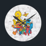 Vintage 123 Sesame Street Round Clock<br><div class="desc">This fun vintage graphic features all your favorite Sesame Pals; Bert & Ernie,  Elmo,  Big Bird & Elmo.     Room décor items; not a toy. ©  2014 Sesame Workshop. www.sesamestreet.org</div>