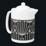 Vintage Abstract Floral in Black and White Pattern Teapot<br><div class="desc">Interesting and minimalistic are the words that come to mind as you look upon this classic retro abstract floral pattern in black and white that is oh so art deco and very elegant. This pattern from a bygone era translates perfectly to both fashion and home decor items. The perfect gift...</div>