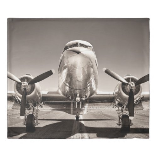 vintage airplane on a runway duvet cover