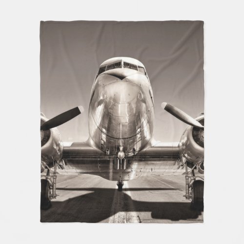 vintage airplane on a runway fleece blanket