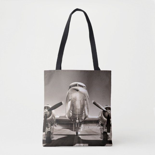 vintage airplane on a runway tote bag (Front)