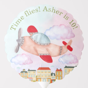 Vintage Airplane with Pastel Clouds and Cityscape Balloon
