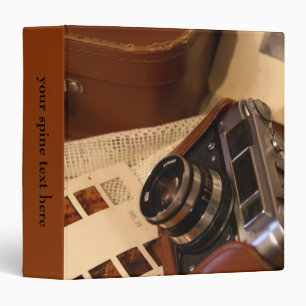 Vintage analog camera in leather brown case 3 ring binder