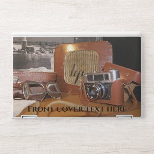 Vintage analog camera in leather brown case HP laptop skin