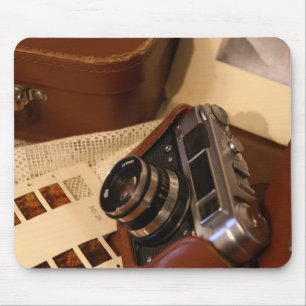 Vintage analog camera in leather brown case mouse pad