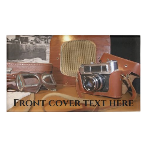 Vintage analog camera in leather brown case name tag