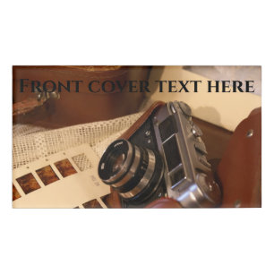 Vintage analog camera in leather brown case name tag