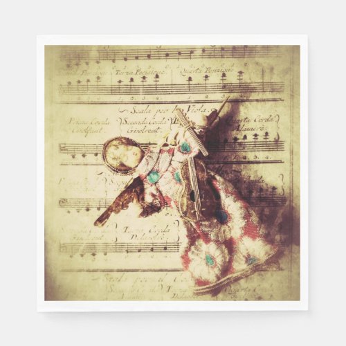 Vintage angel ornament on music napkins