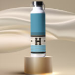 Vintage Bistro Tile Dusty Blue and Gold Monogram Water Bottle<br><div class="desc">These classy blue,  cream and gold faux tile water bottles are perfect gifts. Their clean lines,  simple colors,  and vintage pattern are timeless and versatile. A bistro tile design for sophisticated taste.</div>