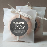 Vintage Black Chalkboard Love is Sweet Wedding Classic Round Sticker<br><div class="desc">Whimsical wedding favor stickers in a round shape feature "Love is Sweet" with a monogram of the bride and groom names and wedding date and with a soft white chalk appearance on a rustic black board background with textured look.</div>