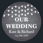 Vintage Black Chalkboard  String Lights Wedding Classic Round Sticker<br><div class="desc">This is vintage style Black Chalkboard String Lights Wedding sticker. This wedding favor stickers feature is a "String Lights On Chalkboard" with a monogram of the bride and groom names and wedding date and with a soft white chalk appearance on a rustic black board background with textured look.These stickers can...</div>