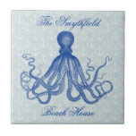 Vintage Blue Octopus with Anchors Personalized Tile<br><div class="desc">This beautiful antique octopus drawing* from the 19th Century has been recolored blue and placed on a pretty gray-blue distressed / grunge background with a faint anchor pattern. The result is an original collage design to match your nautical and beach theme decor. The Victorian octopus has plenty of waving tentacles....</div>