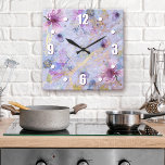 Vintage blue purple floral watercolor romantic square wall clock<br><div class="desc">Bold, white easy-to-read numerals, along with white, purple, and blue watercolor flowers, overlay white script on a gorgeous, soft periwinkle purple blue, gold veined background. Enliven up your favorite room with this chic, stunning, stylish wall clock. Your choice of a round or square clock face. Makes a wonderful, elegant statement...</div>