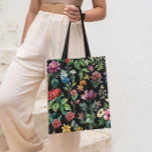 Vintage Botanical Elegance Black Tote Bag<br><div class="desc">Carry the beauty of a blossoming garden with you with our 'Vintage Botanical Elegance' tote bag. Designed for style-conscious individuals and nature lovers, this tote features a stunning display of vintage-style floral illustrations set against a chic black background. It's the perfect accessory for the eco-friendly shopper or the busy professional...</div>