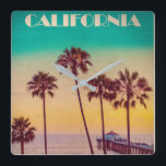 Vintage California Sunset Beach Square Wall Clock<br><div class="desc">EXCLUSIVE to Vintage republic: Retro style California travel poster design featuring Manhattan beach pier at sunset. In the foreground are a stand of palm trees against a yellow and aqua green sunset</div>