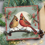 Vintage Cardinal Birds Family Holly Christmas Card<br><div class="desc">Step back in time with our Vintage Cardinal Birds Family Holly Christmas Card. This charming square card features a beautiful watercolor painting of vibrant cardinals perched on a holly branch against a backdrop of a muted light green night sky against a beautiful bright moon and gentle snowfall. With its customizable...</div>