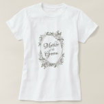 Vintage Cherish Rose Gold Oval Mother of the Groom T-Shirt<br><div class="desc">Vintage Cherish White Floral & Rose Gold Painted Roses and Flowers. A Vintage Classic and Elegant Look, and Plenty of Gray, Ivory White, Rose Gold, Dusty Pink, Pine Green, and Gray leaves and foliage. With Hand Painted Floral elements, Vintage Classic Script Fonts and Rose Gold Elegant Floral Oval Frame -...</div>