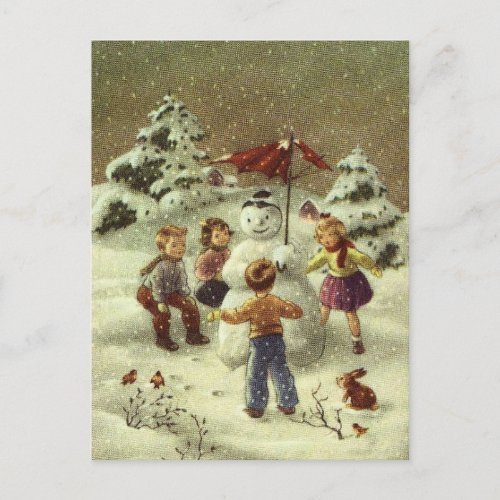 Vintage Children Making a snowman Postcard