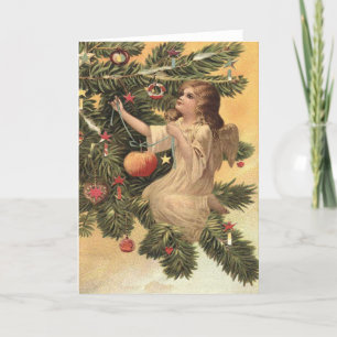 Vintage Christmas angel on tree Holiday Card