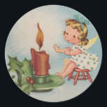 Vintage Christmas Angel Warm By a candle Classic Round Sticker<br><div class="desc">Vintage Christmas Angel Warm By a candle</div>