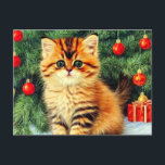 Vintage Christmas Cat Postcard<br><div class="desc">Postcard featuring a vintage Christmas cat! An orange kitty with black stripes sits in the snow. Behind the cat is a Christmas tree with red and yellow ornaments. Also on the snow is a red present. A perfect gift for the Christmas season and cat lovers!</div>