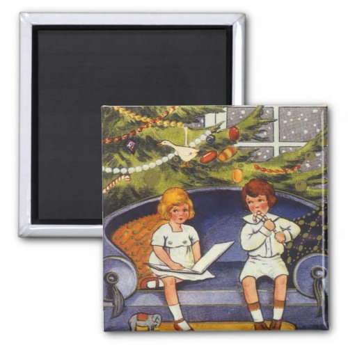 Vintage Christmas Children Sitting on a Couch Magnet