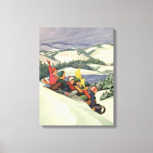 Vintage Christmas Children Sledding on a Mountain Canvas Print