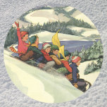Vintage Christmas, Children Sledding on a Mountain Classic Round Sticker<br><div class="desc">Vintage illustration Christmas holiday snowscape design featuring children,  a group of boys and girls having fun sledding down a snow covered hill. Mountains,  trees and a lake complete this beautiful winter landscape. Reminds me of winters in Donner in Lake Tahoe. Magazine Cover Art,  February 1936.</div>