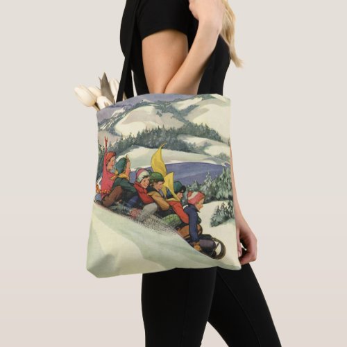 Vintage Christmas Children Sledding on a Mountain Tote Bag