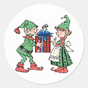 Vintage Christmas Elves Gift Giving Classic Round Sticker by santasgrotto at Zazzle
