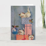 Vintage Christmas Kittens and Gifts Holiday Card<br><div class="desc">Vintage Christmas Kittens and Gifts Holiday Card . This design features three kittens playing on a tower of Christmas Gifts. What a beautiful retro holiday scene. Personalize this custom design with your own inside greeting.</div>