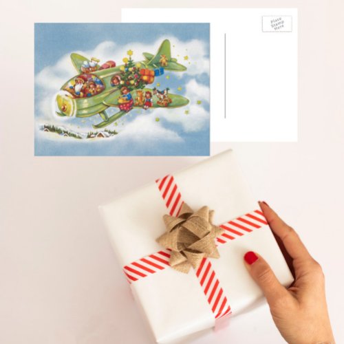 Vintage Christmas Santa Claus Flying an Airplane Holiday Postcard