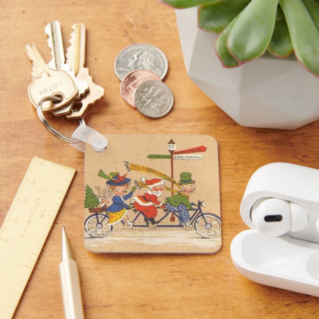 Vintage Christmas, Santa Claus Riding a Bicycle Keychain (Desk)