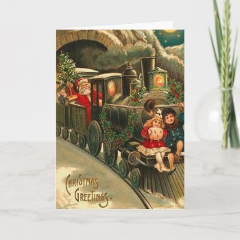 Vintage Christmas Santa On Train Holiday Card by greetingcardsonline at Zazzle